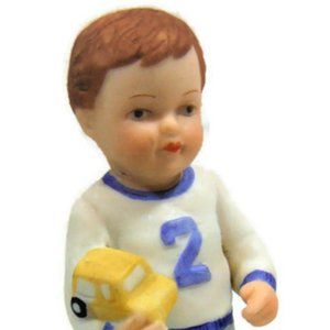 growing up boy figurines